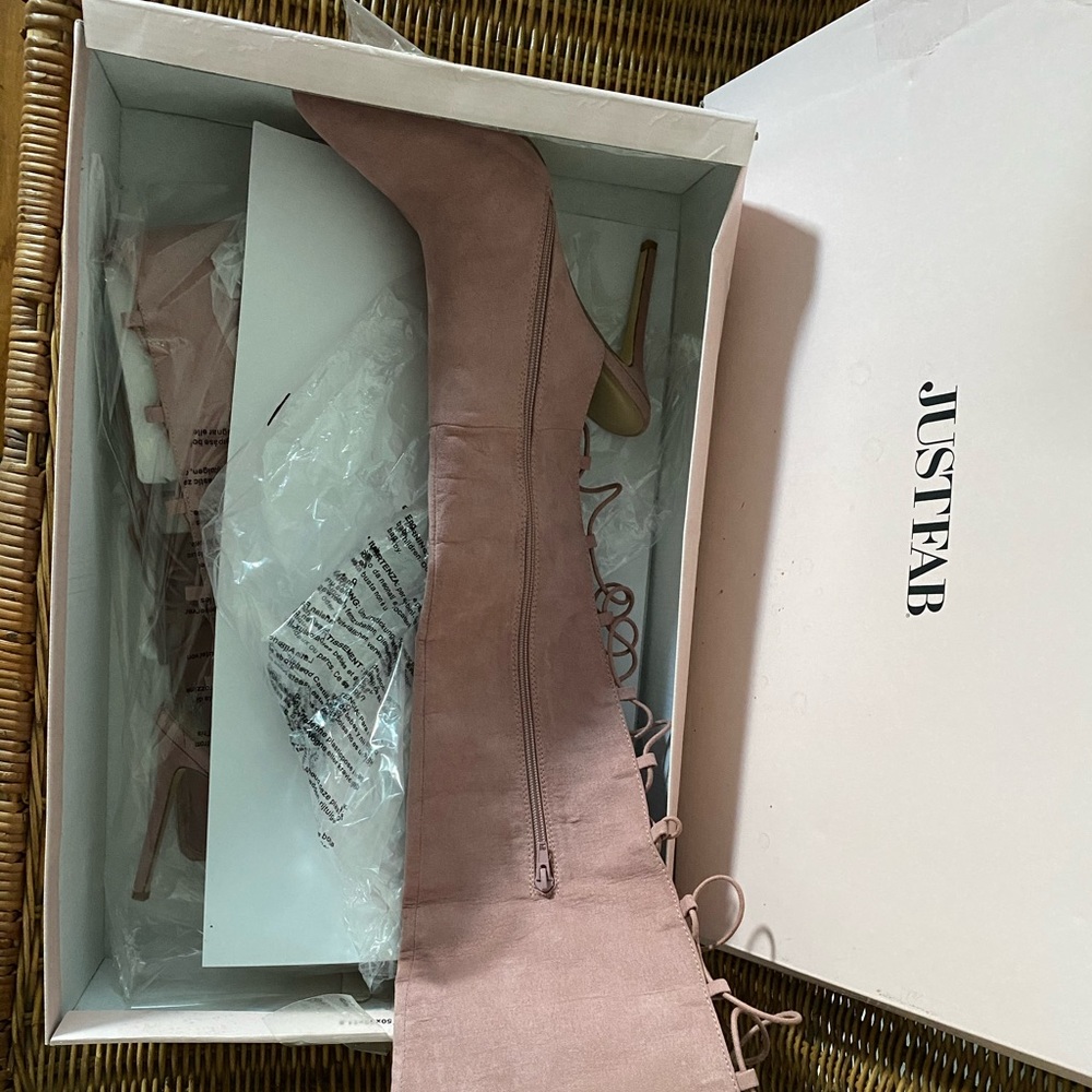 Thigh high heeled boots